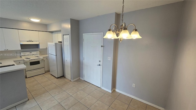 kitchen featuring range hood, a chandelier, decorative light fixtures, white appliances, and white cabinets