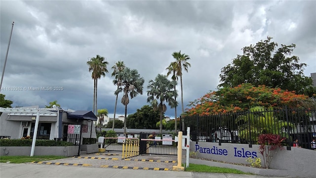 view of gate with fence