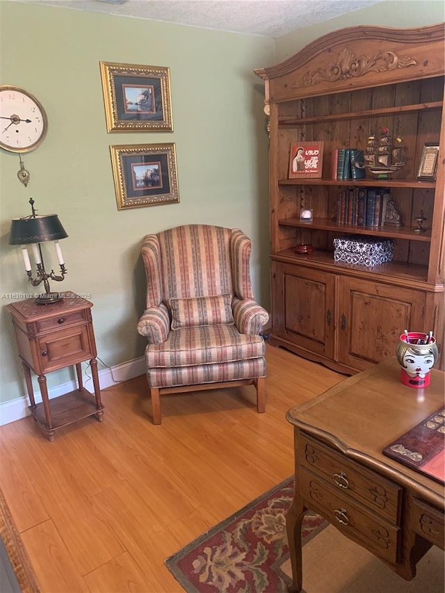 825 El Rado St, Coral Gables, FL 33134 - sitting room with light wood finished floors and baseboards