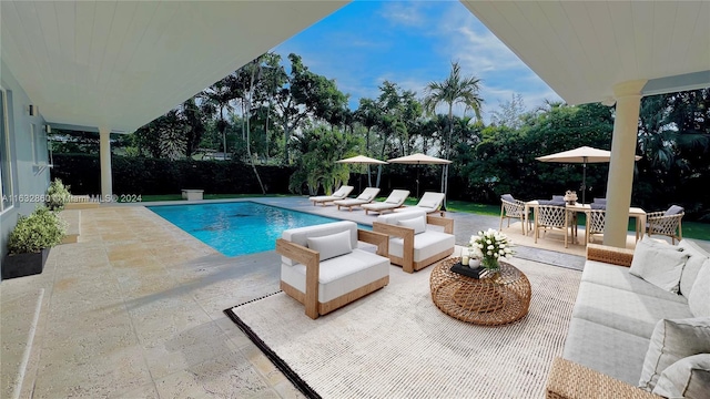 view of swimming pool with an outdoor hangout area and a patio area