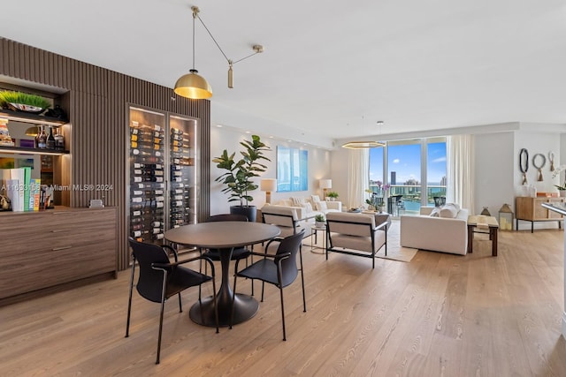 dining room with light hardwood / wood-style floors