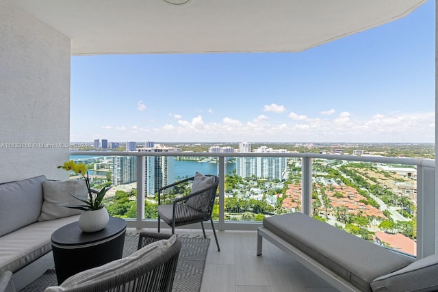 balcony featuring a water view