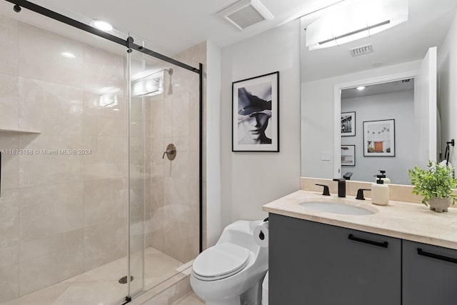 bathroom featuring walk in shower, vanity, and toilet