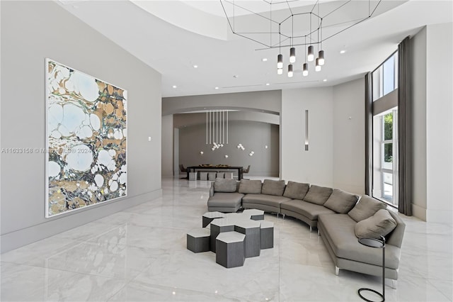 living room with an inviting chandelier