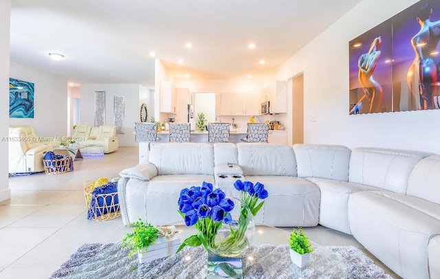 living room featuring light tile patterned flooring