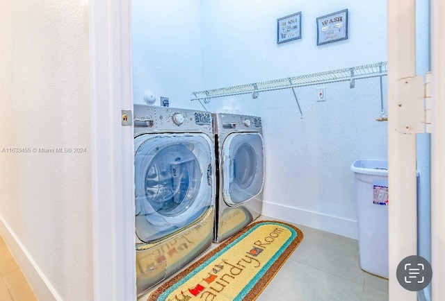 laundry area featuring washing machine and dryer