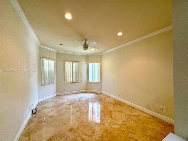 empty room with crown molding and ceiling fan