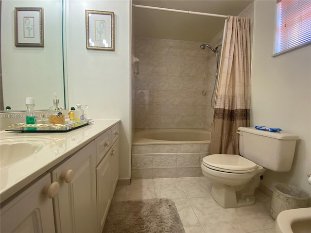 full bathroom featuring tile patterned floors, vanity, toilet, and shower / bath combination with curtain