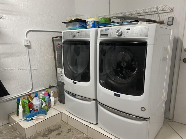 clothes washing area with independent washer and dryer