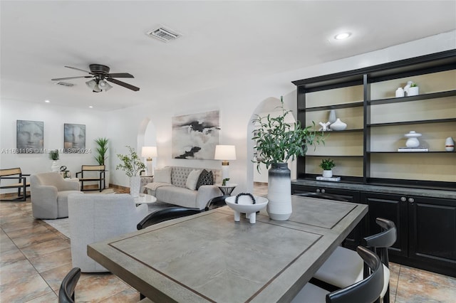 dining area with ceiling fan