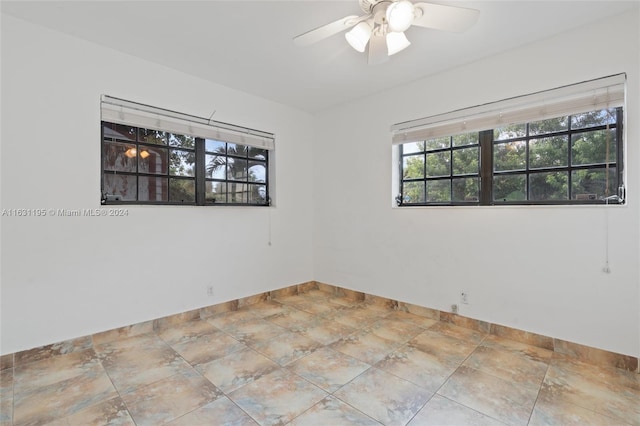 empty room with ceiling fan