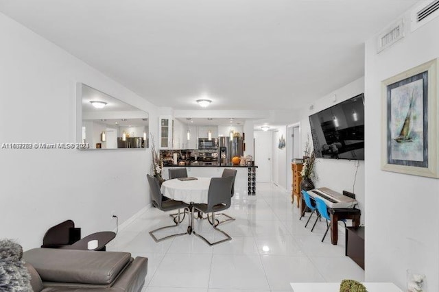 dining room with light tile patterned floors