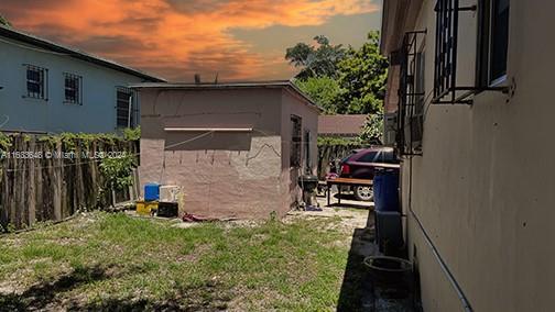 view of property exterior at dusk