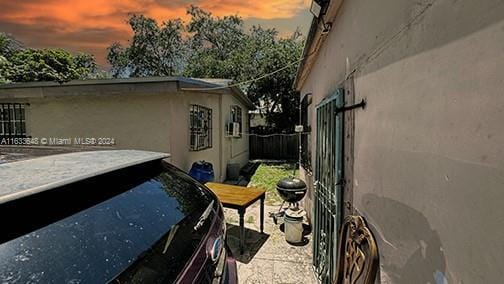 view of property exterior at dusk