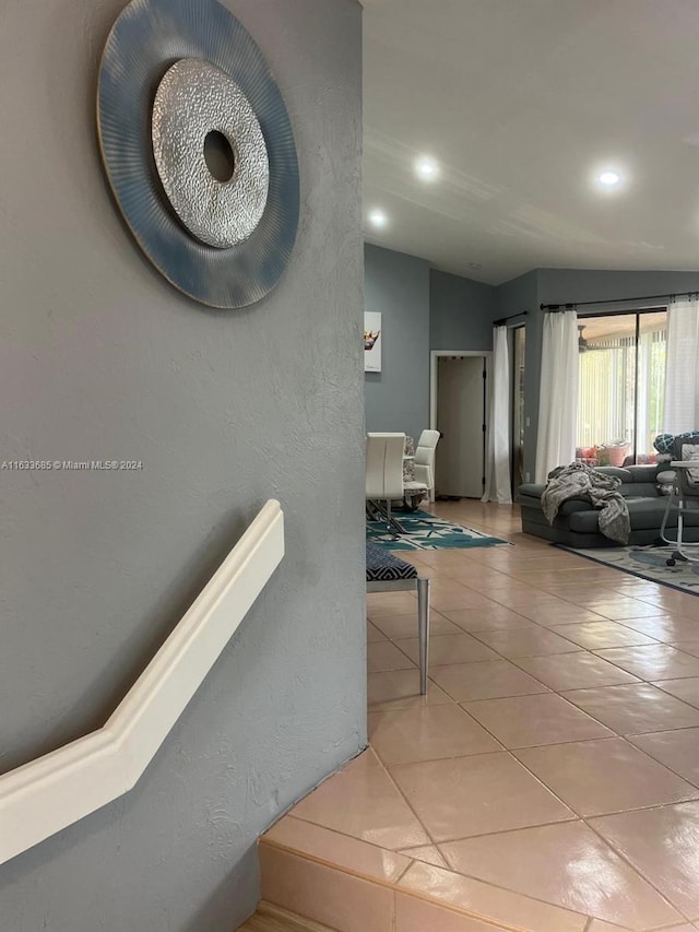 hallway featuring tile patterned flooring