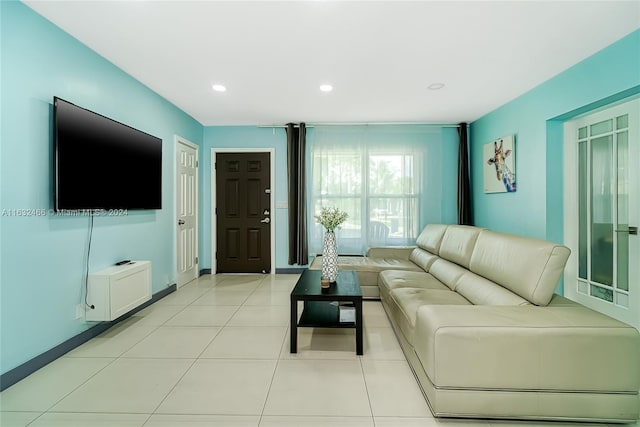 216 SW 6th St, Hallandale Beach, FL 33009 - living room featuring baseboards, recessed lighting, and light tile patterned floors