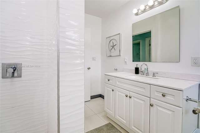 bathroom with vanity and tile patterned flooring