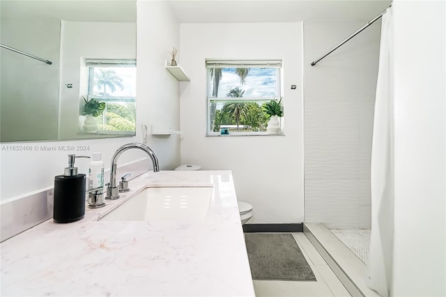 216 SW 6th St, Hallandale Beach, FL 33009 - bathroom featuring toilet, vanity, and curtained shower