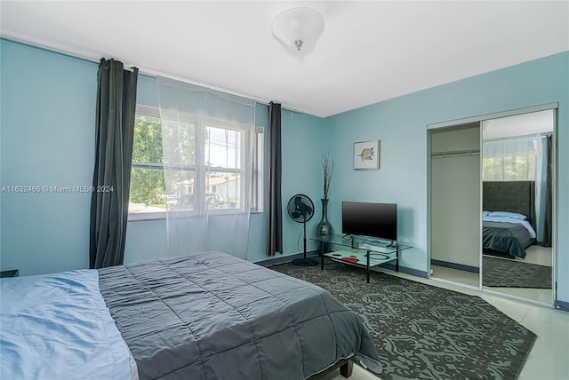 216 SW 6th St, Hallandale Beach, FL 33009 - bedroom featuring a closet and baseboards