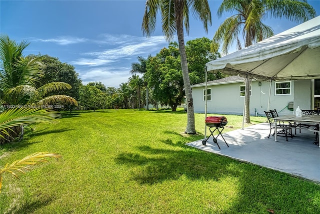 216 SW 6th St, Hallandale Beach, FL 33009 - view of yard with a patio