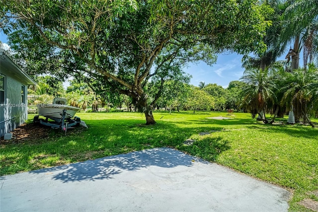 216 SW 6th St, Hallandale Beach, FL 33009 - view of yard featuring a patio
