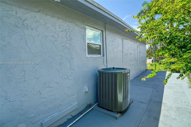 view of property exterior featuring central AC unit