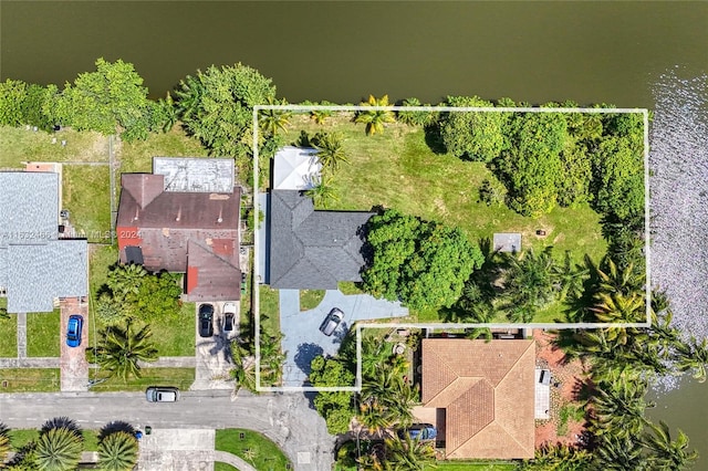 bird's eye view with a water view