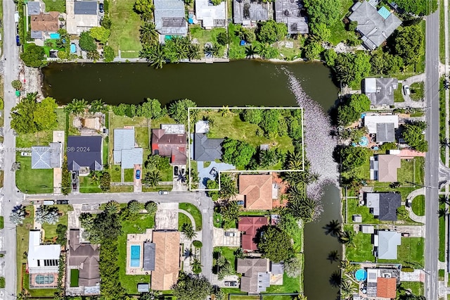 bird's eye view with a water view