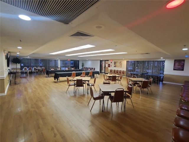 dining space featuring hardwood / wood-style floors