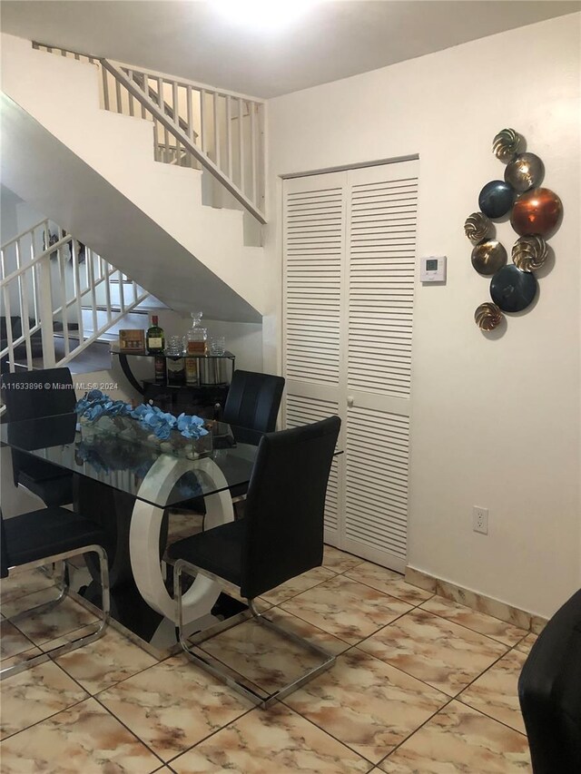 view of tiled dining area