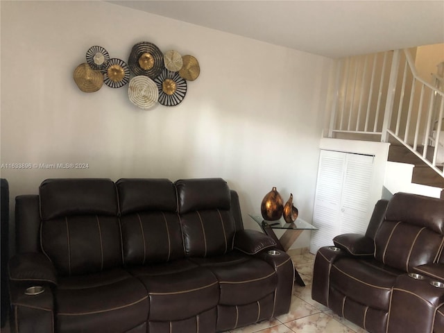 16700 NW 55th Ave Unit 12, Miami Gardens, FL 33055 - living room featuring stairs