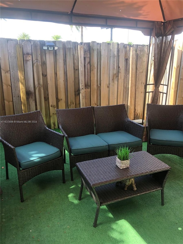 16700 NW 55th Ave Unit 12, Miami Gardens, FL 33055 - view of patio featuring a gazebo