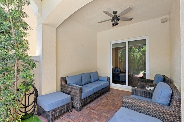 view of patio / terrace featuring an outdoor living space and ceiling fan