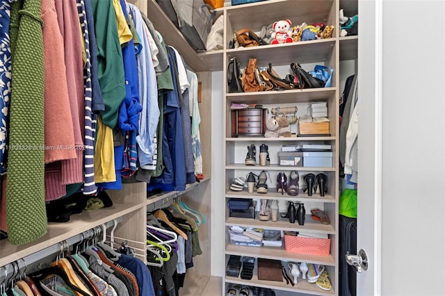 spacious closet featuring tile patterned floors