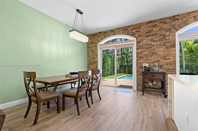 dining room with light wood-type flooring