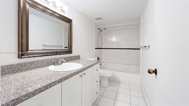 full bathroom with toilet, tile patterned floors, tiled shower / bath combo, and vanity