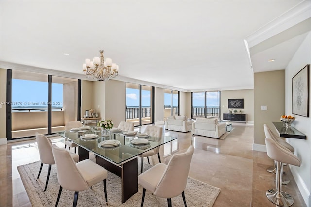 dining room featuring a wall of windows, a notable chandelier, and light tile patterned floors