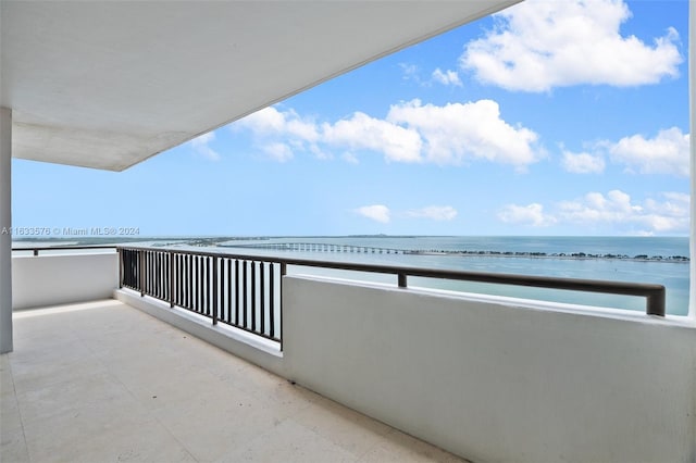 balcony featuring a water view