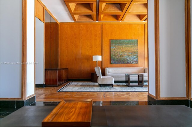 living room featuring wooden walls