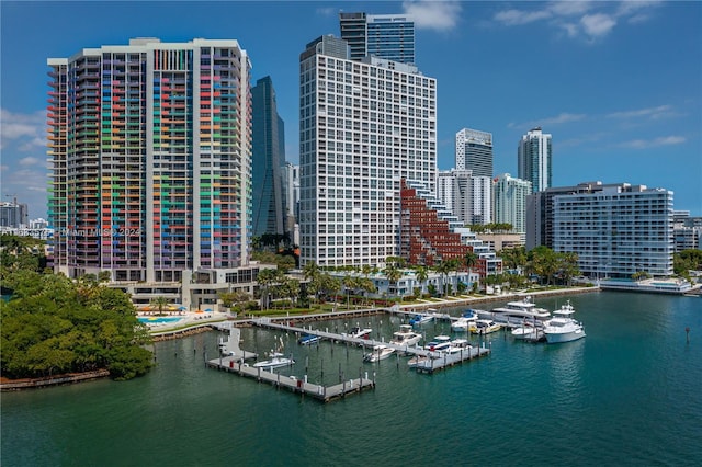 aerial view featuring a view of city and a water view