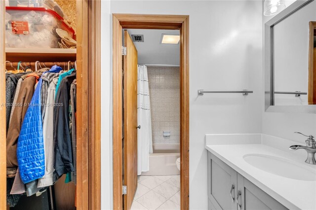 full bathroom featuring vanity, toilet, and shower / bath combo