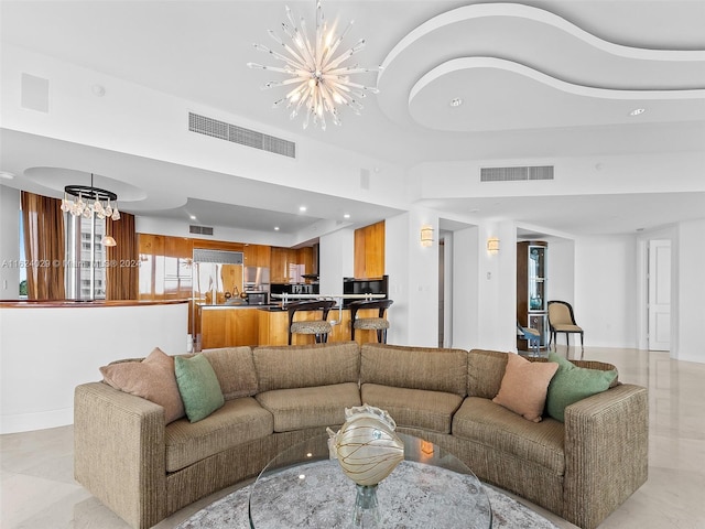 living room featuring an inviting chandelier