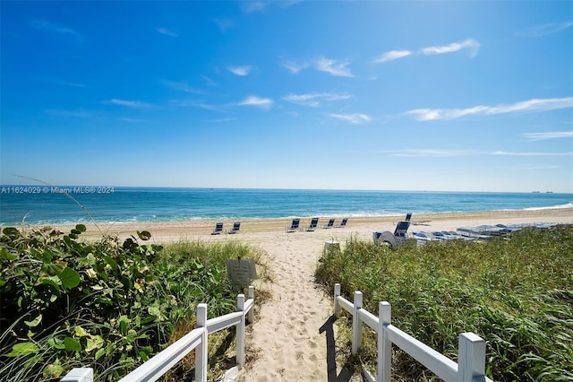 property view of water featuring a beach view