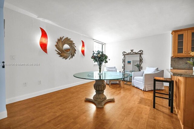 sitting room featuring light hardwood / wood-style flooring