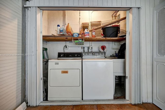 washroom with washer and dryer