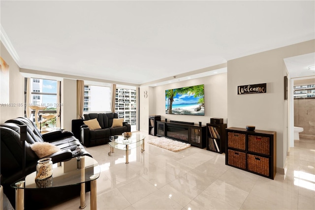 tiled living room featuring ornamental molding