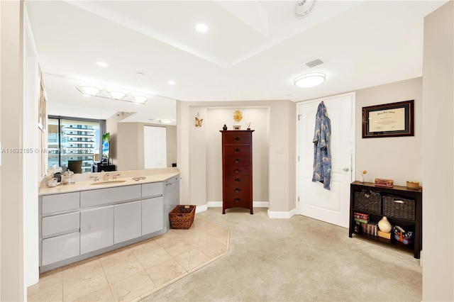 bathroom with vanity and tile patterned flooring