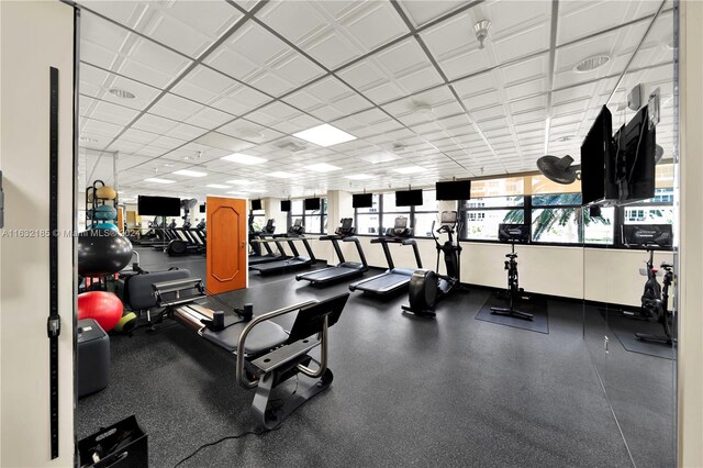 5757 Collins Ave Unit 801, Miami Beach, FL 33140 - gym featuring a paneled ceiling
