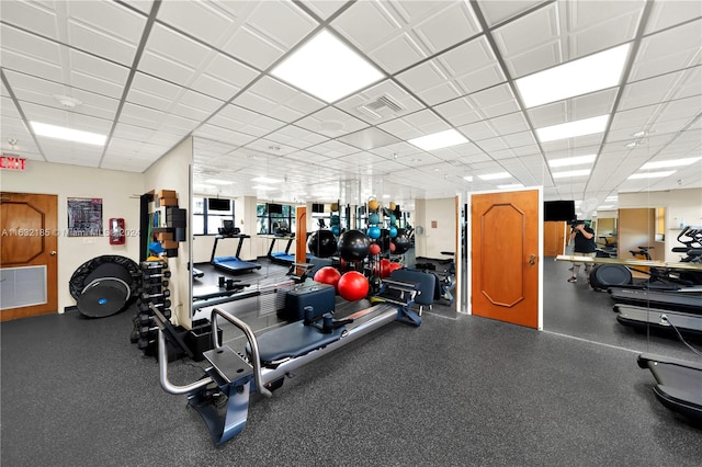 gym with a drop ceiling