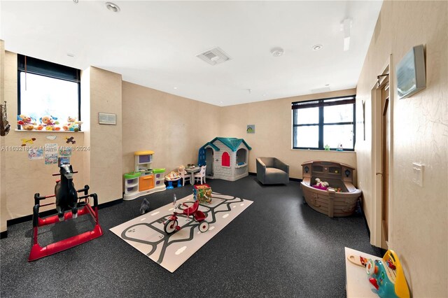 5757 Collins Ave Unit 801, Miami Beach, FL 33140 - playroom featuring rubber floors
